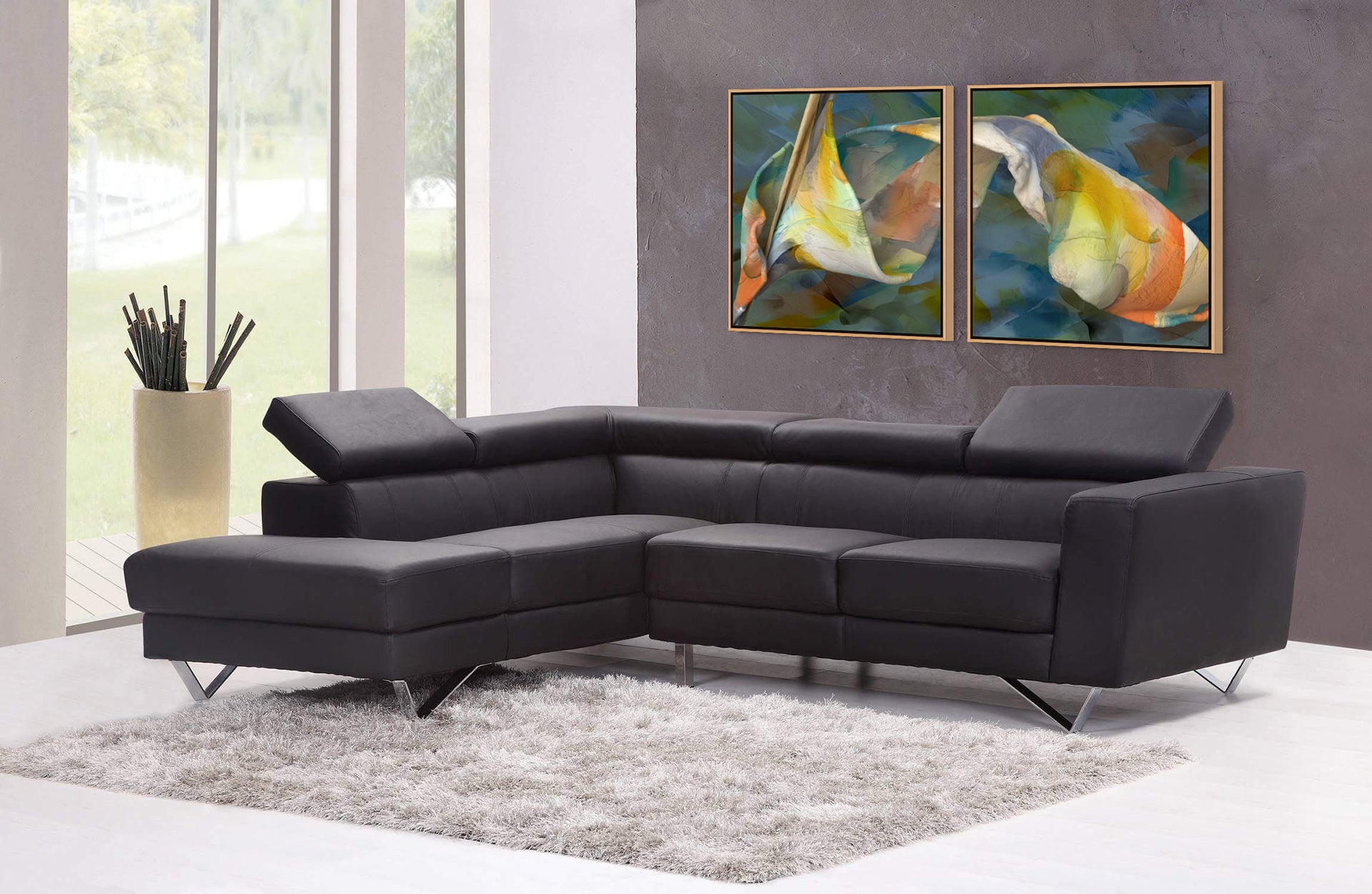 A modern living room has a dark gray L-shaped sofa on a fluffy light gray rug. The Shape Of Unfolding Thought - Diptych Left canvas art, made from premium cotton canvas, hangs on a beige wall. Large windows reveal trees outside, and a vase with sticks stands near the sofa.