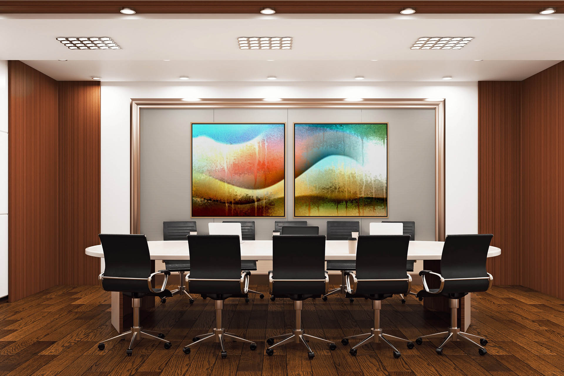 A modern conference room features a long white table with eight black swivel chairs, wood-paneled walls, and two large Awesomeness canvas artworks displaying vibrant colors. The floor is wooden, and the lighting is recessed.