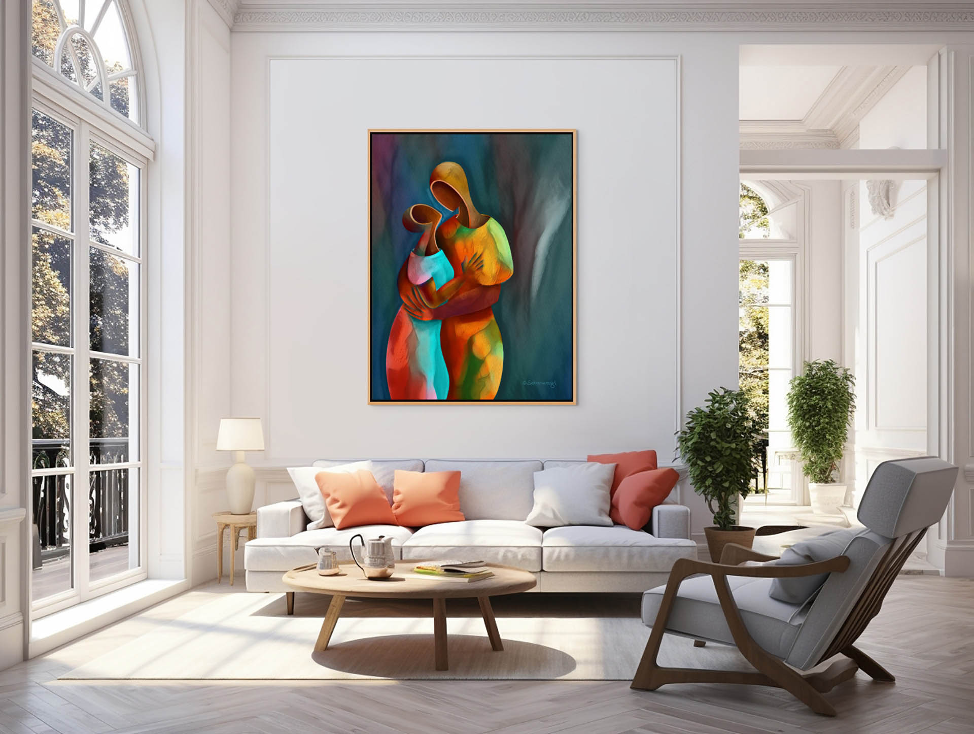 A modern living room includes a white sofa with orange and gray pillows, a round wooden coffee table, and an armchair. The walls are adorned with Confidant - Canvas Art, a vibrant abstract painting of embracing figures. Large windows let in natural light, enhancing the inviting atmosphere.