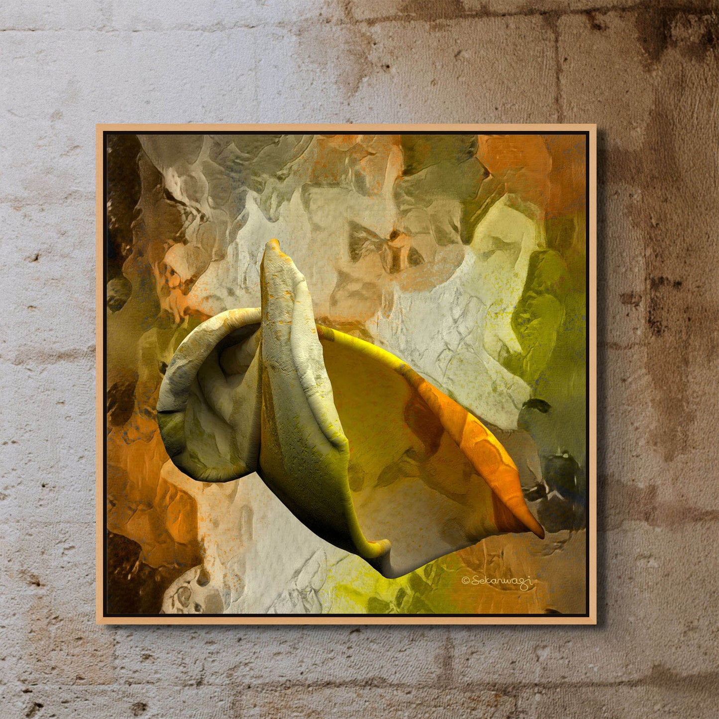 The Emerging Thought canvas art showcases an abstract design with earthy swirls and a folded shape in yellow, green, and orange. It features a textured background of similar hues, all elegantly framed and mounted on a rustic stone wall.