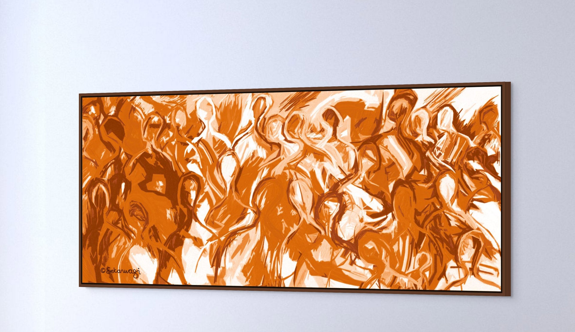 The We Are All Connected - Canvas Art features dynamic, fluid forms in orange and white, resembling figures in motion. It conveys energy and movement with a simple dark frame, mounted on a light-colored wall.