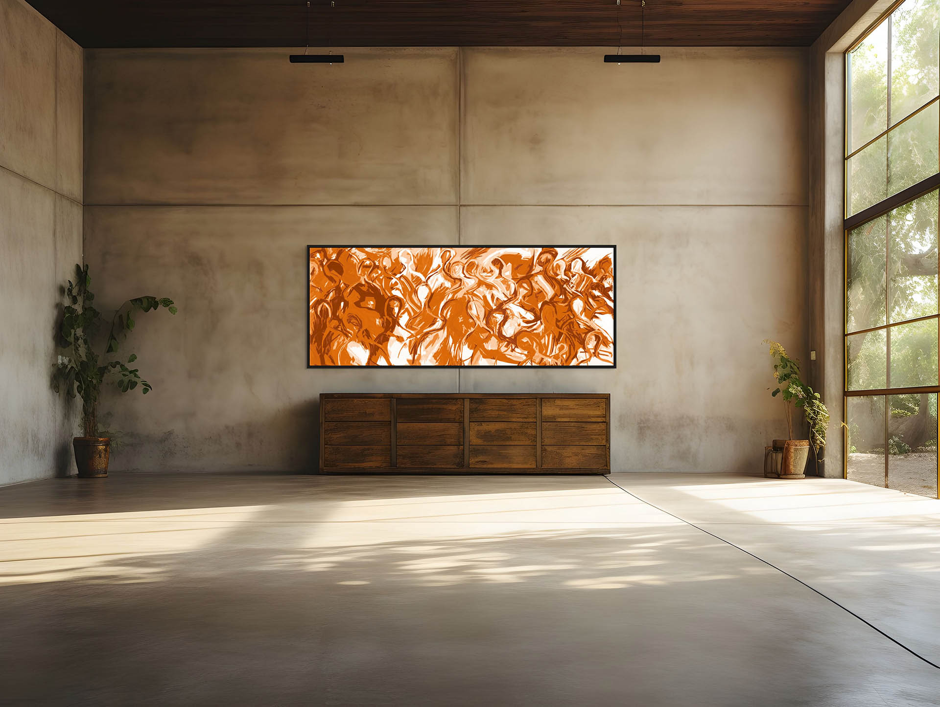 A spacious room features high ceilings and large windows. A long wooden cabinet rests against a concrete wall, topped by We Are All Connected - Canvas Art in orange and white. Two potted plants flank the cabinet, as sunlight streams through the window.