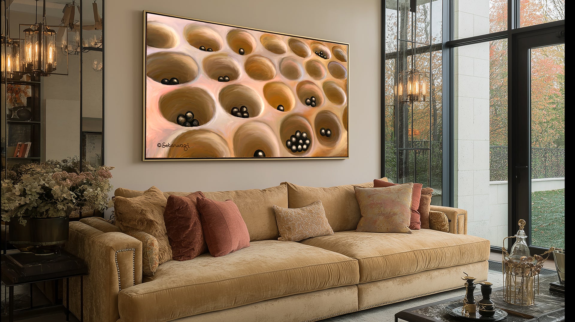 A modern living room features a beige sofa with pastel pillows, a large floral arrangement, and "Your Move" - Canvas Art above the sofa, depicting the Omweso Uganda board game with  the game black playing tokens.